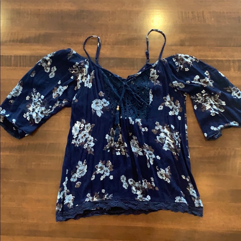 navy blue blouse with light blue flowers